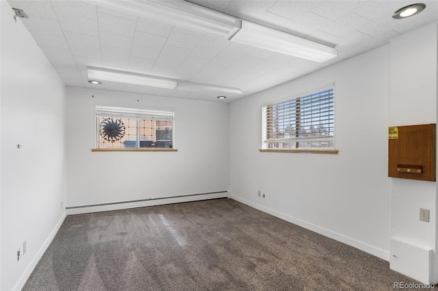 4731 W 66th Ave, Arvada, CO 80003 - empty room featuring baseboard heating, carpet, and baseboards