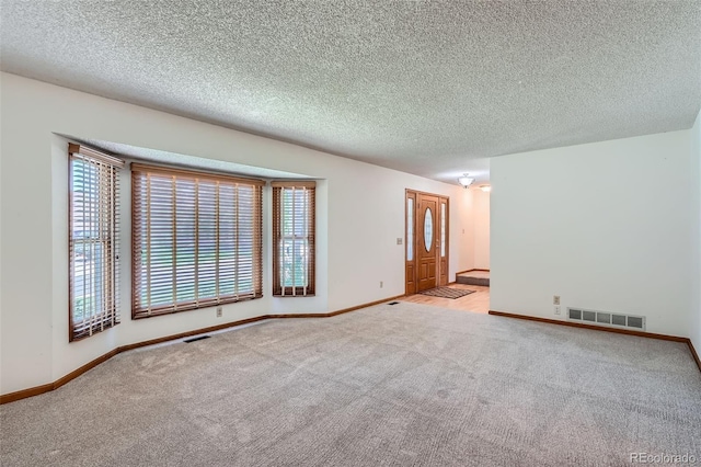 20596 E Shefield Ct, Parker, CO 80138 - carpeted empty room with baseboards and a textured ceiling