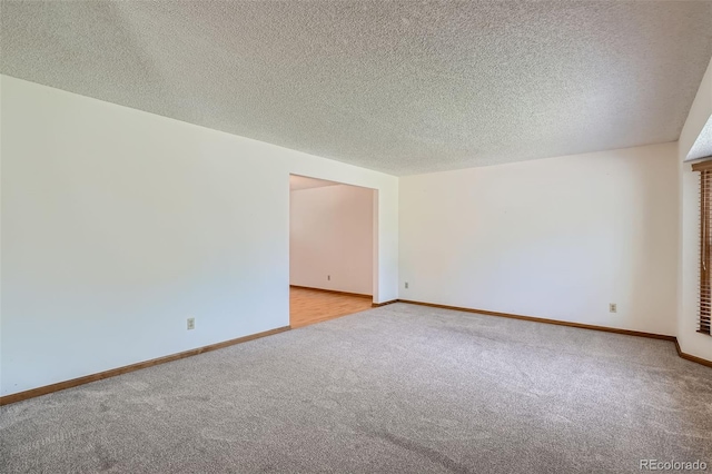 20596 E Shefield Ct, Parker, CO 80138 - unfurnished room with light colored carpet and a textured ceiling