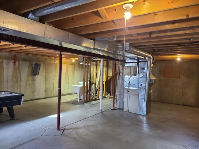 20596 E Shefield Ct, Parker, CO 80138 - unfinished basement featuring gas water heater and heating unit