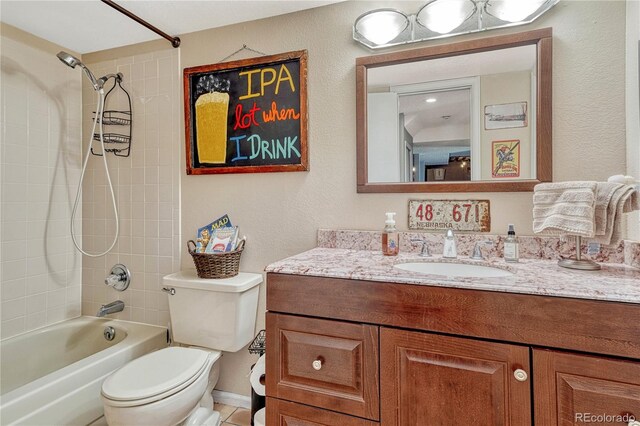 bathroom with vanity, toilet, and shower / washtub combination
