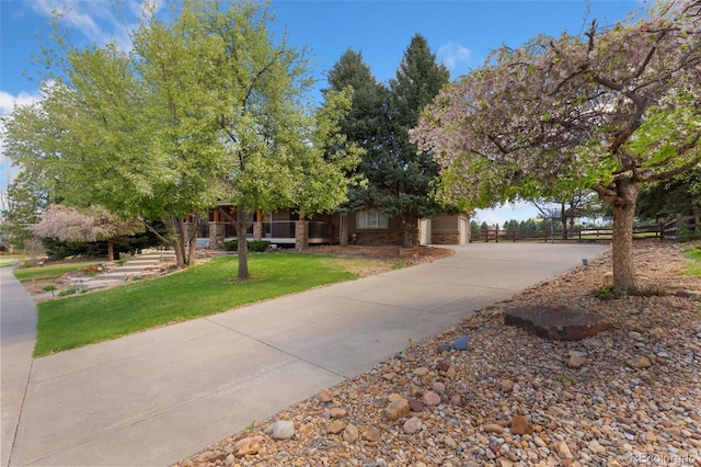 surrounding community featuring a yard