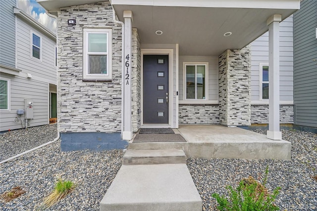 4612 S Wenatchee St Unit A, Aurora, CO 80015 - property entrance with stone siding