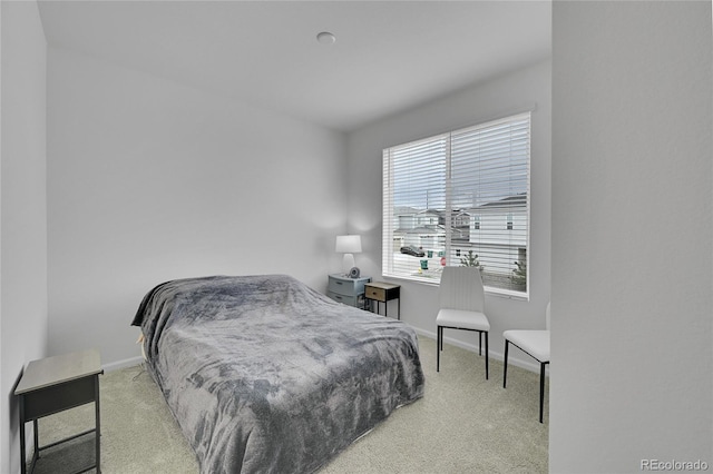 4612 S Wenatchee St Unit A, Aurora, CO 80015 - carpeted bedroom featuring multiple windows