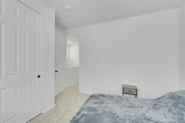 4612 S Wenatchee St Unit A, Aurora, CO 80015 - unfurnished bedroom featuring light carpet and baseboards