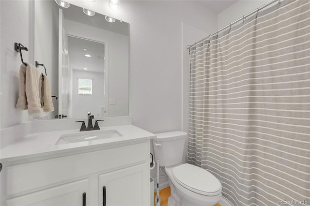 4612 S Wenatchee St Unit A, Aurora, CO 80015 - bathroom featuring vanity and a shower with shower curtain