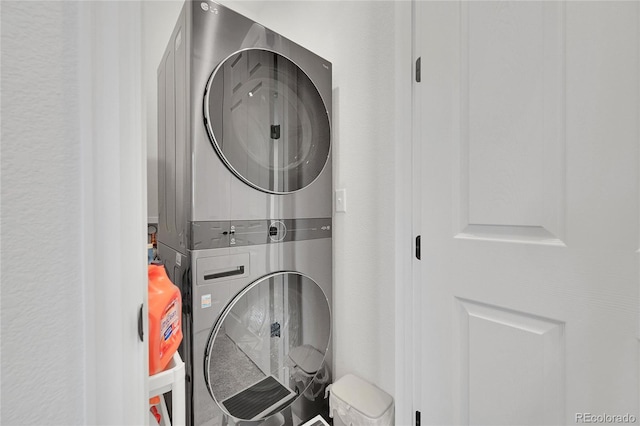 4612 S Wenatchee St Unit A, Aurora, CO 80015 - laundry area featuring stacked washing machine and dryer