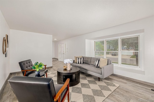 6005 S Vivian St, Littleton, CO 80127 - living area featuring light wood finished floors and recessed lighting