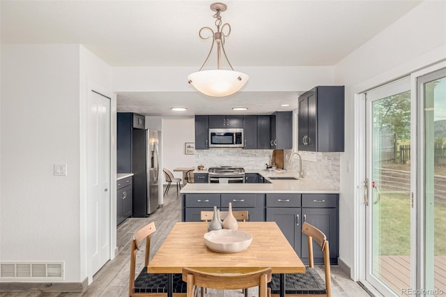 6005 S Vivian St, Littleton, CO 80127 - dining room featuring light wood-type flooring and baseboards