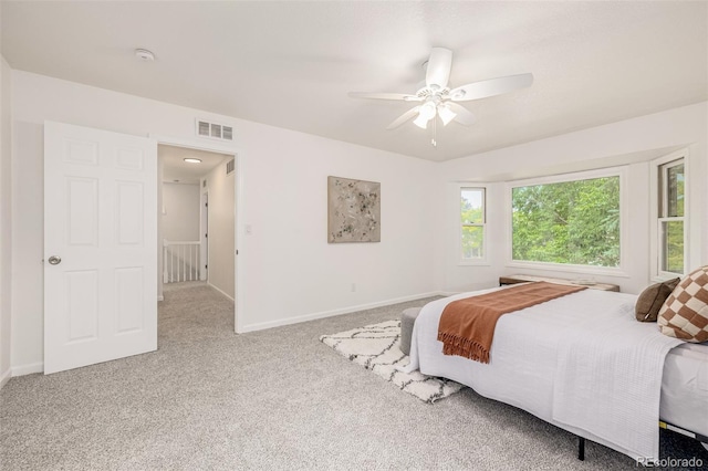 6005 S Vivian St, Littleton, CO 80127 - carpeted bedroom with baseboards and a ceiling fan