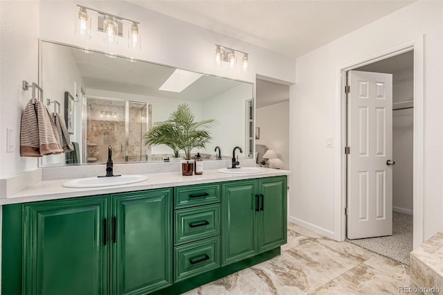 6005 S Vivian St, Littleton, CO 80127 - full bathroom featuring a shower stall and double vanity
