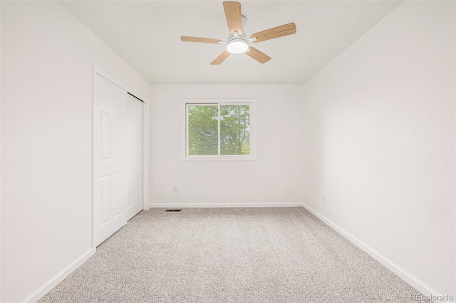 6005 S Vivian St, Littleton, CO 80127 - unfurnished bedroom with light carpet, a closet, and a ceiling fan