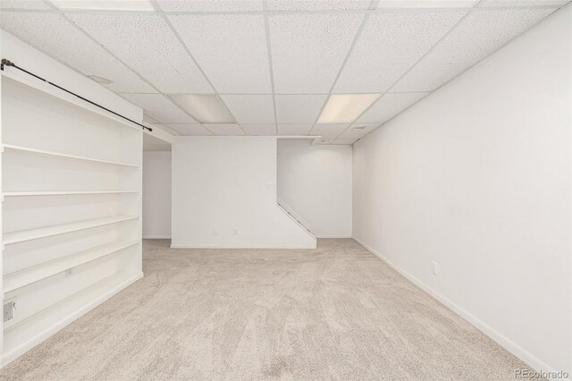 6005 S Vivian St, Littleton, CO 80127 - finished below grade area with a paneled ceiling and carpet