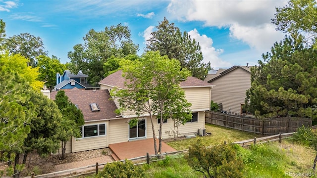 6005 S Vivian St, Littleton, CO 80127 - rear view of property with a shingled roof and a patio
