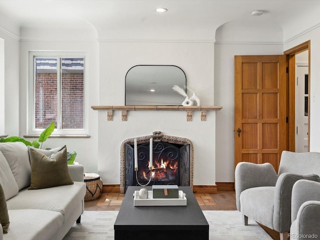 2535 Leyden St, Denver, CO 80207 - living area with a lit fireplace, baseboards, wood finished floors, and recessed lighting