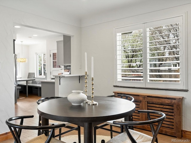 2535 Leyden St, Denver, CO 80207 - dining space with light wood-type flooring and recessed lighting