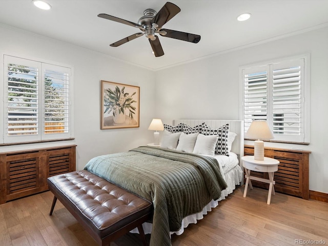 2535 Leyden St, Denver, CO 80207 - bedroom featuring hardwood / wood-style floors, crown molding, recessed lighting, and ceiling fan