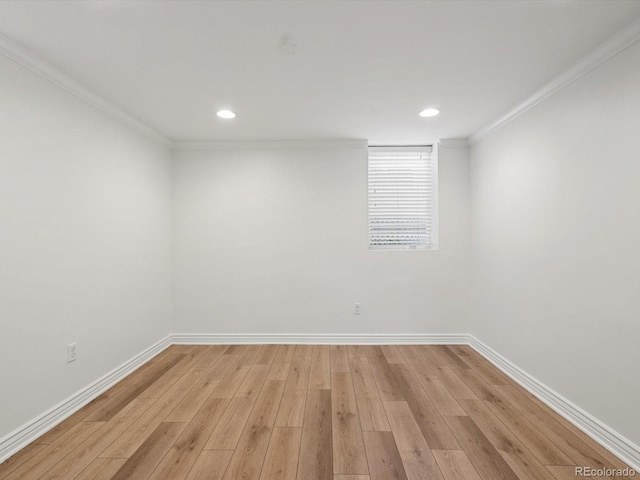 2535 Leyden St, Denver, CO 80207 - unfurnished room with crown molding, baseboards, light wood-style floors, and recessed lighting
