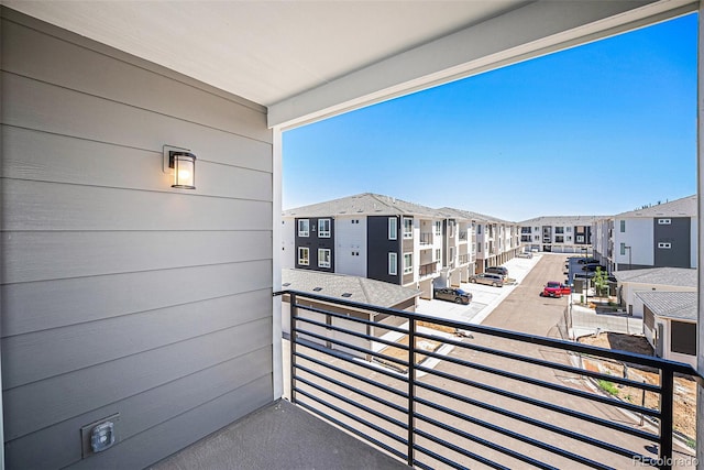 balcony featuring a residential view