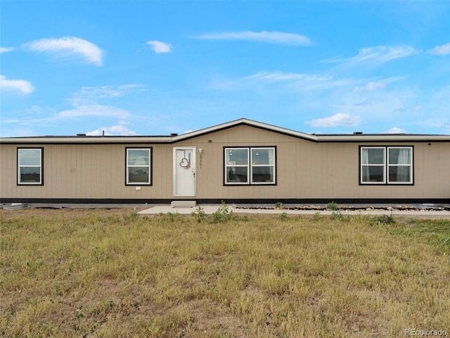69501 E 72nd Ave, Byers, CO 80103 - manufactured / mobile home featuring a front yard