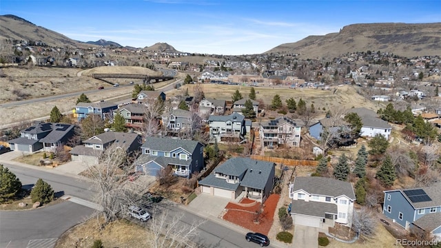 drone / aerial view featuring a mountain view and a residential view