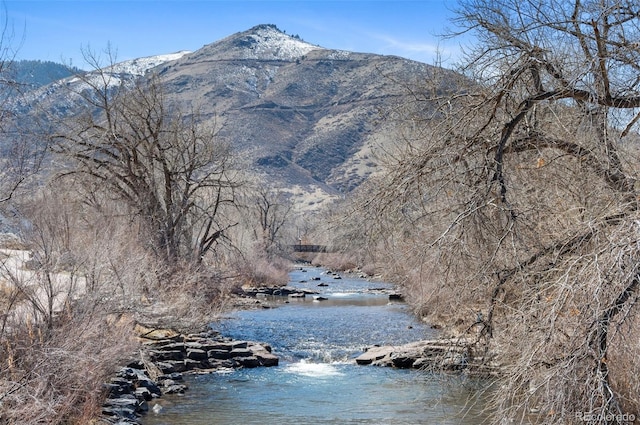 property view of water featuring a mountain view