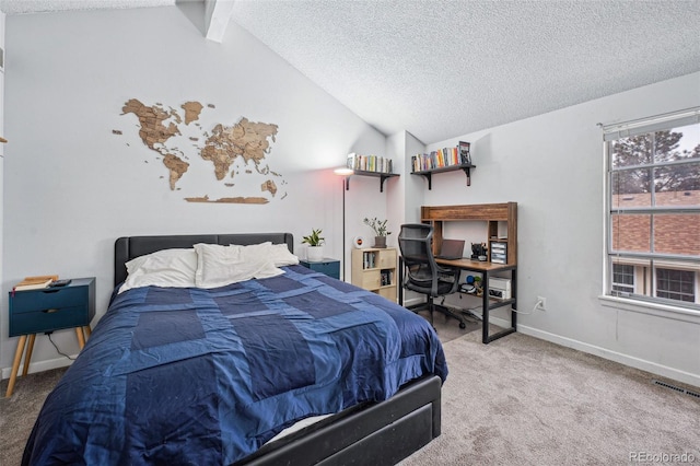 bedroom with lofted ceiling with beams, a textured ceiling, carpet flooring, and visible vents