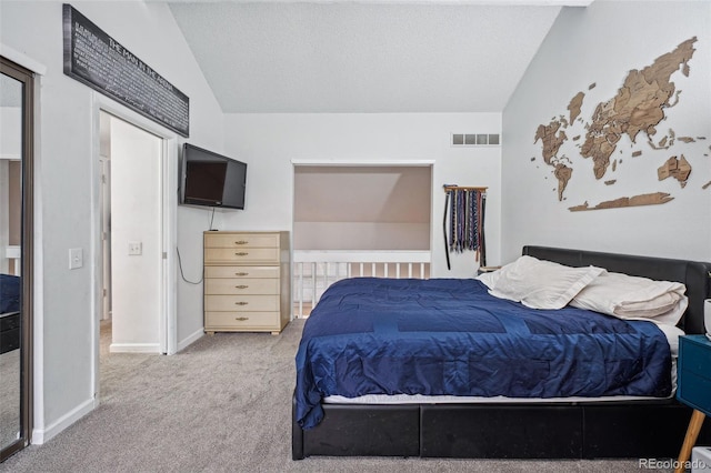 carpeted bedroom featuring visible vents, vaulted ceiling, a textured ceiling, and baseboards