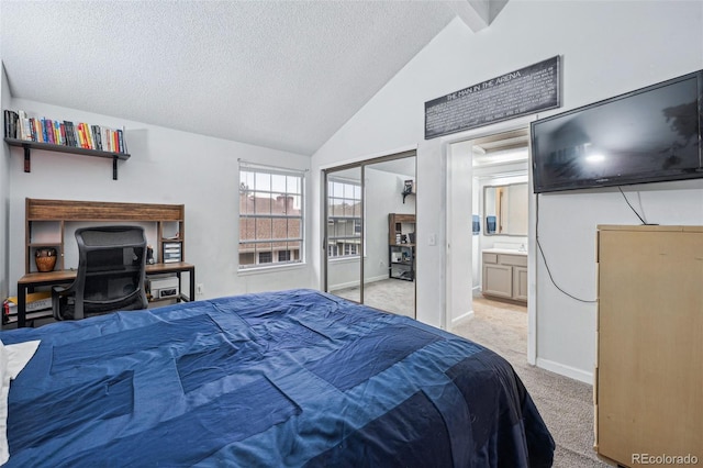 bedroom featuring a textured ceiling, vaulted ceiling with beams, light carpet, baseboards, and a closet