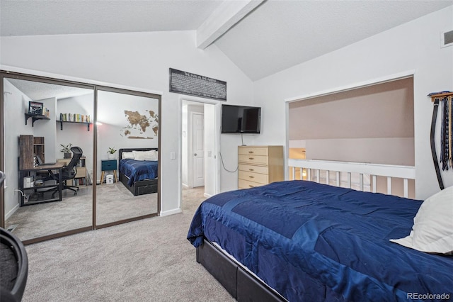 carpeted bedroom with a closet, visible vents, lofted ceiling with beams, and a textured ceiling