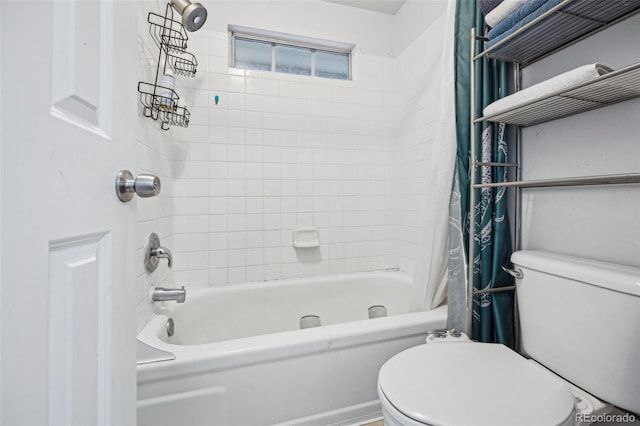 bathroom featuring toilet and shower / bath combo with shower curtain