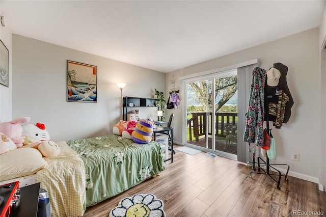1236 Sequerra St, Broomfield, CO 80020 - bedroom featuring access to outside and wood finished floors