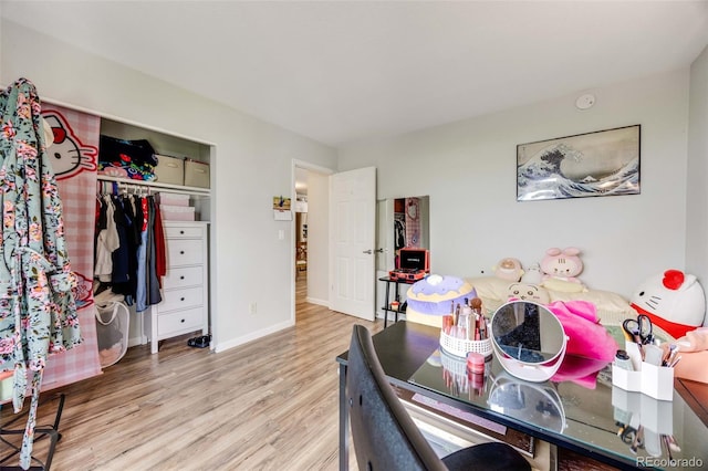 1236 Sequerra St, Broomfield, CO 80020 - bedroom featuring wood finished floors and a closet