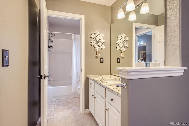 full bathroom featuring toilet, shower / bath combination with curtain, tile patterned floors, and vanity