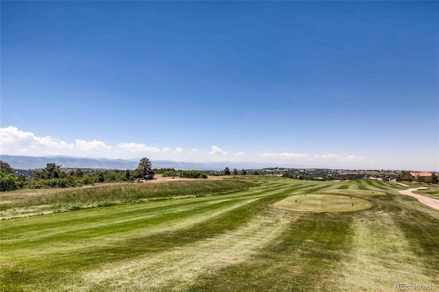 surrounding community featuring a lawn