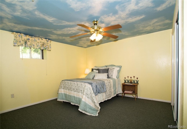 7684 Beverly Blvd, Castle Pines, CO 80108 - bedroom featuring dark carpet, baseboards, and a ceiling fan
