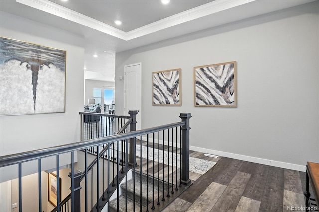 9538 Bear River St, Littleton, CO 80125 - hall featuring an upstairs landing, crown molding, wood finished floors, recessed lighting, and a raised ceiling