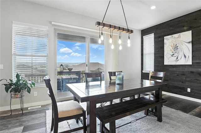 9538 Bear River St, Littleton, CO 80125 - dining room featuring wood finished floors, recessed lighting, and wooden walls