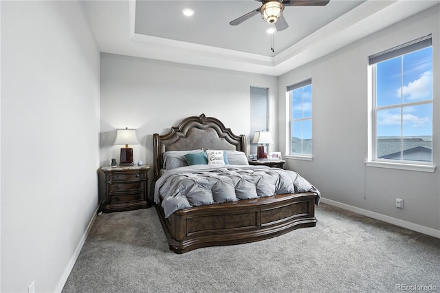 9538 Bear River St, Littleton, CO 80125 - bedroom with a tray ceiling, carpet flooring, a ceiling fan, recessed lighting, and ornamental molding