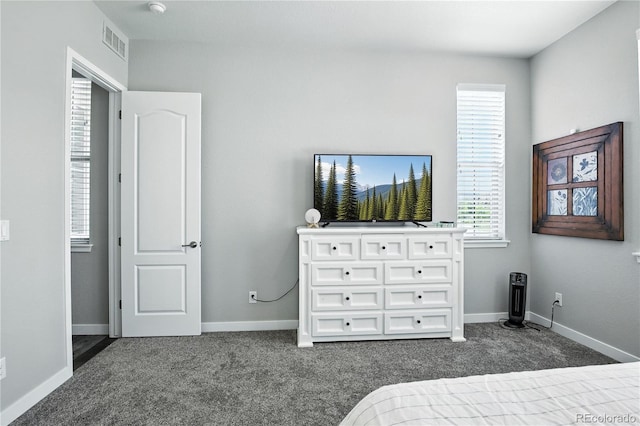 9538 Bear River St, Littleton, CO 80125 - bedroom featuring dark colored carpet and baseboards