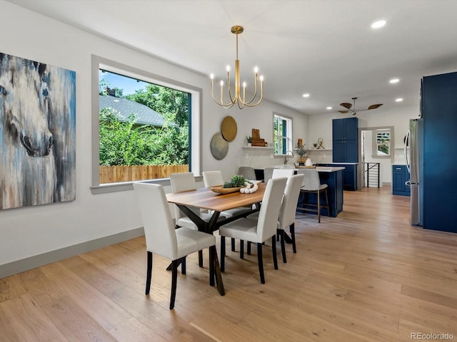 883 S Downing St, Denver, CO 80209 - dining area with recessed lighting, light wood-type flooring, and a chandelier