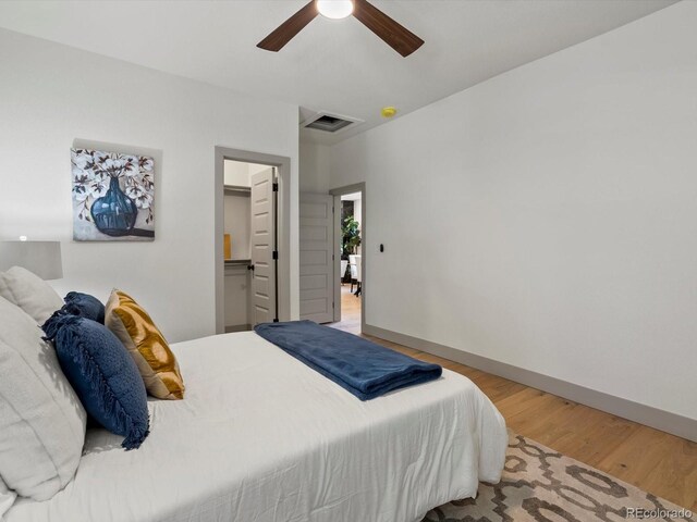 883 S Downing St, Denver, CO 80209 - bedroom featuring wood finished floors and ceiling fan