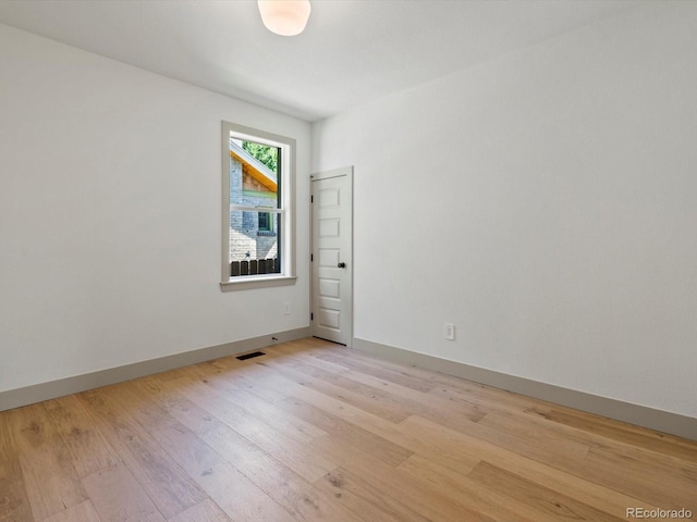 883 S Downing St, Denver, CO 80209 - empty room with light wood finished floors