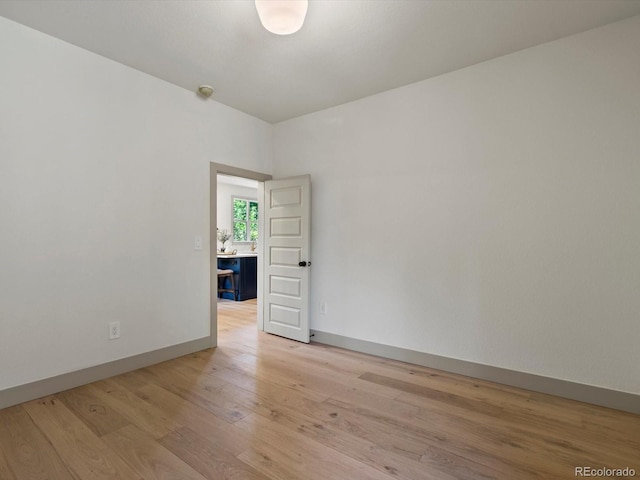 883 S Downing St, Denver, CO 80209 - spare room with light wood-type flooring and baseboards