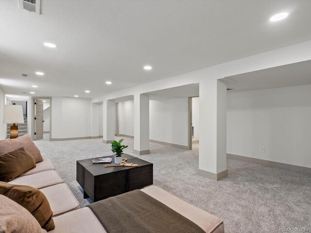 883 S Downing St, Denver, CO 80209 - living room with light carpet and recessed lighting
