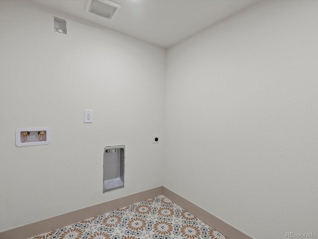 883 S Downing St, Denver, CO 80209 - washroom featuring washer hookup and electric dryer hookup