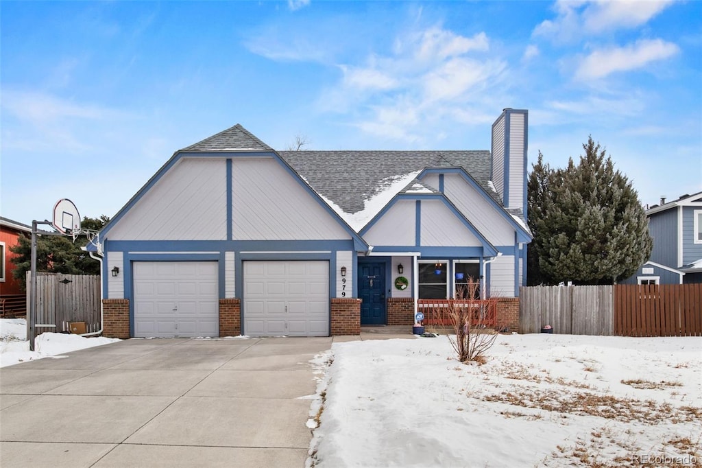 view of front of home with a garage and a porch