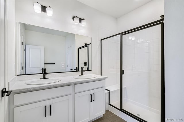 bathroom featuring vanity and walk in shower