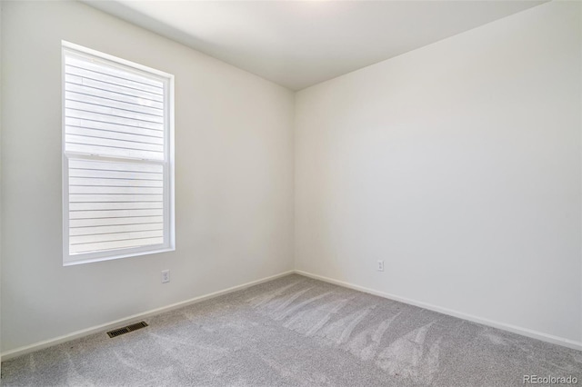 view of carpeted spare room