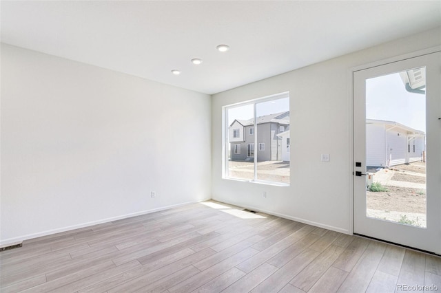 interior space with light hardwood / wood-style floors